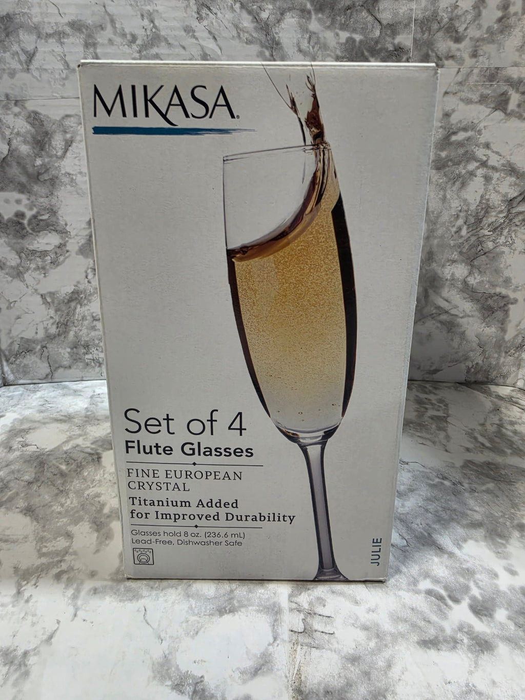 Mikasa flute glasses packaging on a marble surface