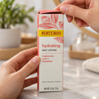 Adult hands opening Burt's Bees Hydrating Day Lotion carton, AI-assisted illustration