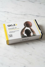 SKLZ Square Up basketball training device packaging on marble
