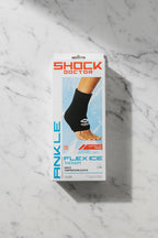 Package of Shock Doctor ankle flex ice therapy compression sleeve on a gray background
