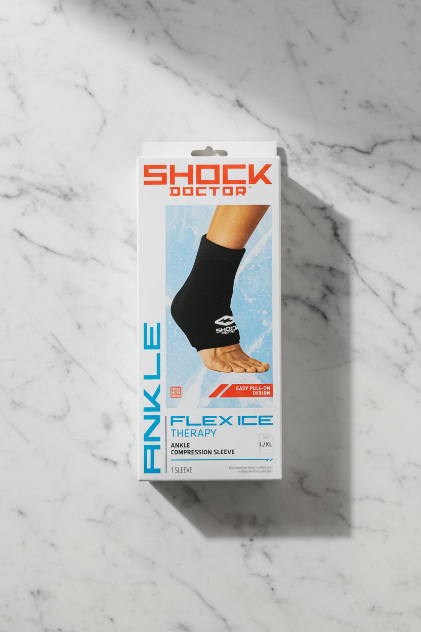 Package of Shock Doctor ankle flex ice therapy compression sleeve on a gray background