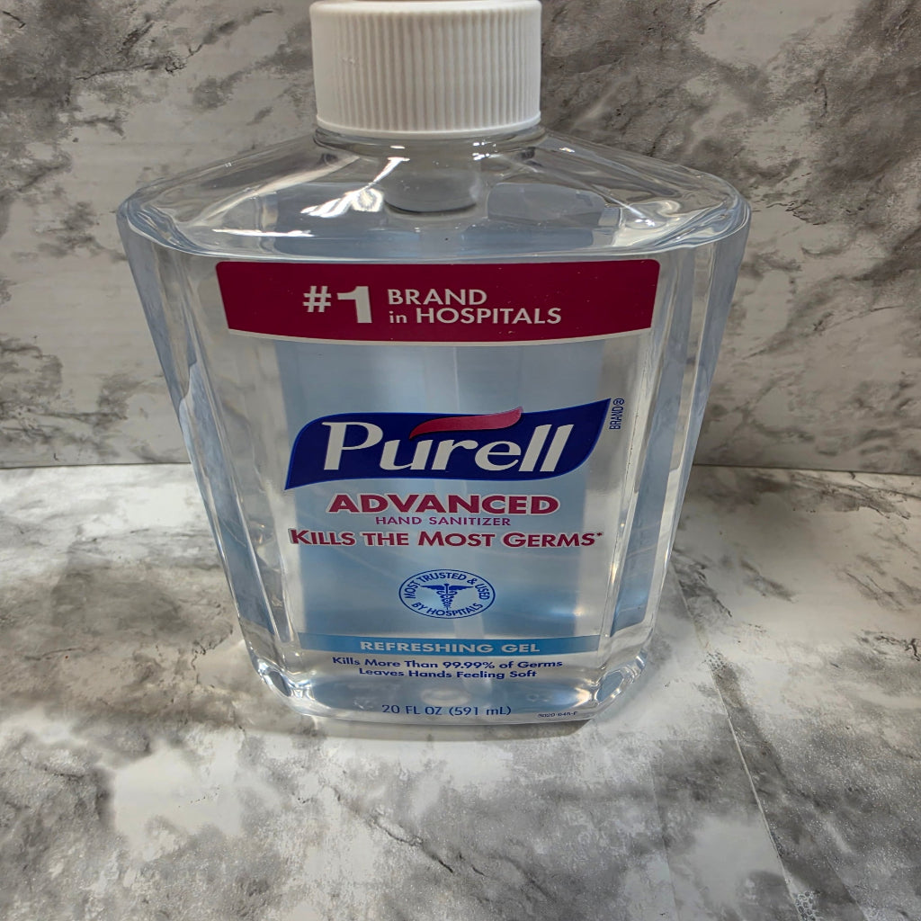 Purell hand sanitizer bottle on a marble surface
