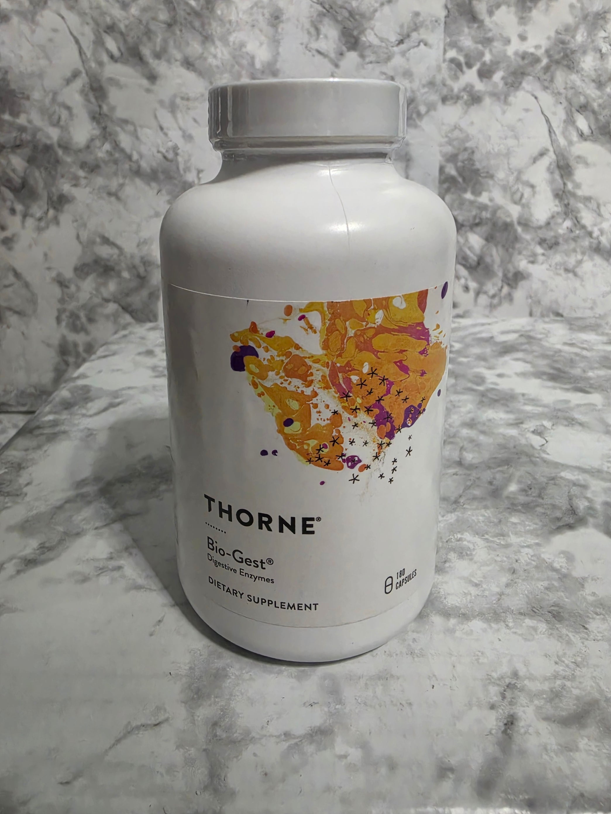 Thorne Research supplement bottle on a marble surface