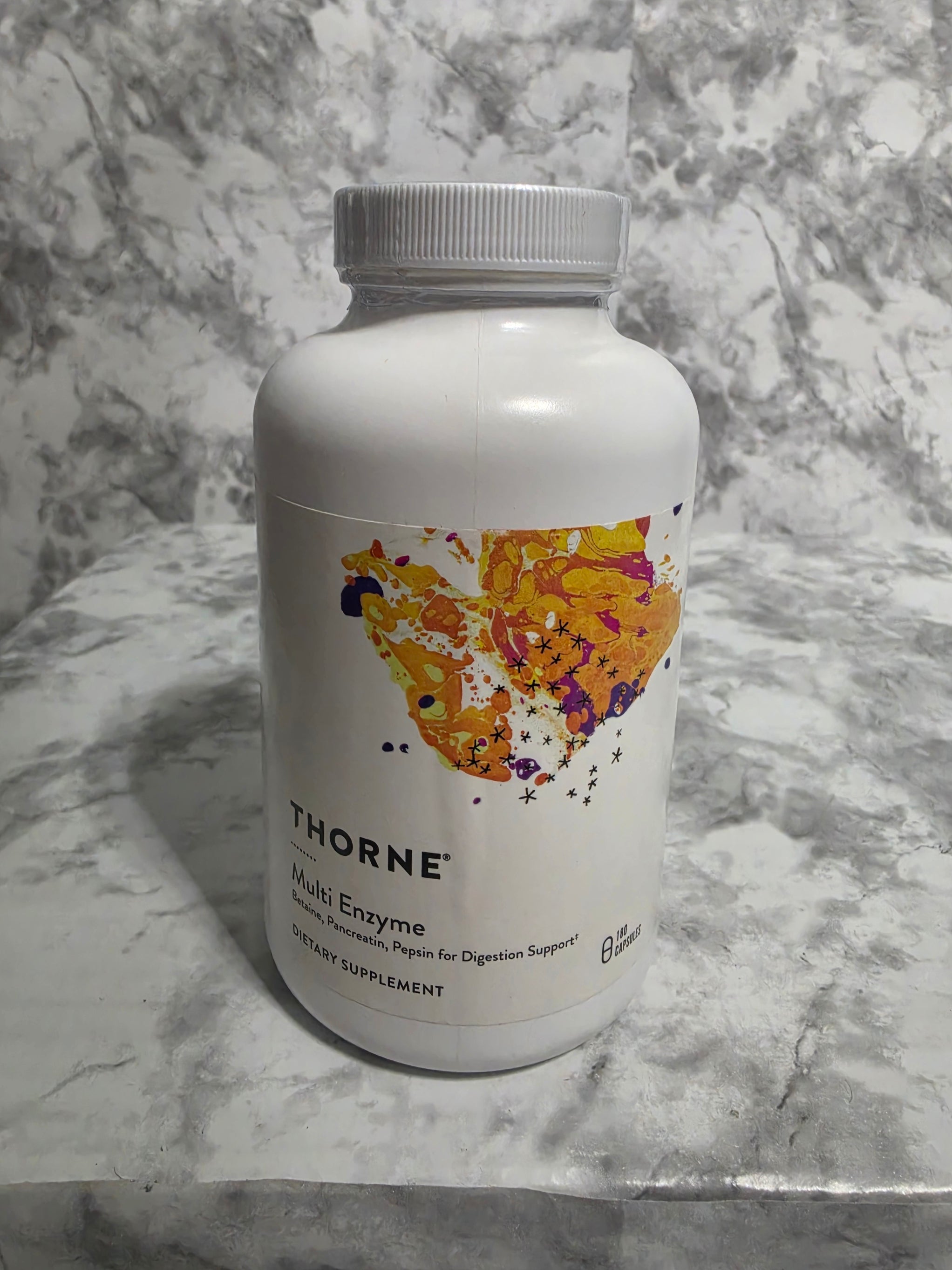 Thorne supplement bottle on a marble surface