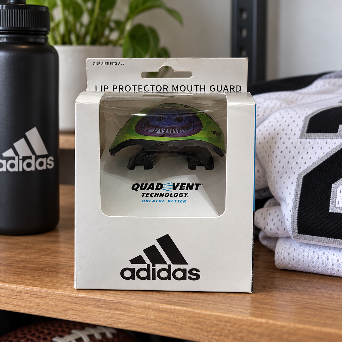AI-styled Adidas Big Mood Demon AD-LP-910 mouthguard in original packaging at a gear shelf