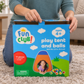 AI-generated lifestyle illustration of an adult opening the Fun Club play tent and balls carton, with contents concealed.