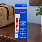 AI-assisted illustration of AfterBurn 2 fl oz carton on a wooden counter beside a travel bag