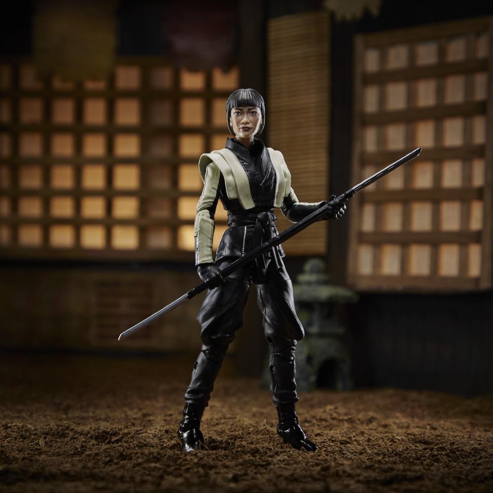 G.I. Joe Classified Series Akiko figure standing with a double-ended blade staff in a miniature courtyard.