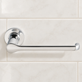 Polished chrome Studio S toilet paper holder mounted on light bathroom tile