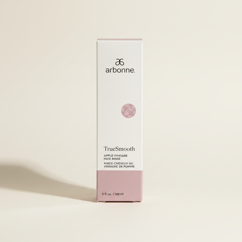 AI-generated contextual image of Arbonne TrueSmooth Apple Vinegar Hair Rinse 5 fl oz boxed product on a neutral studio background