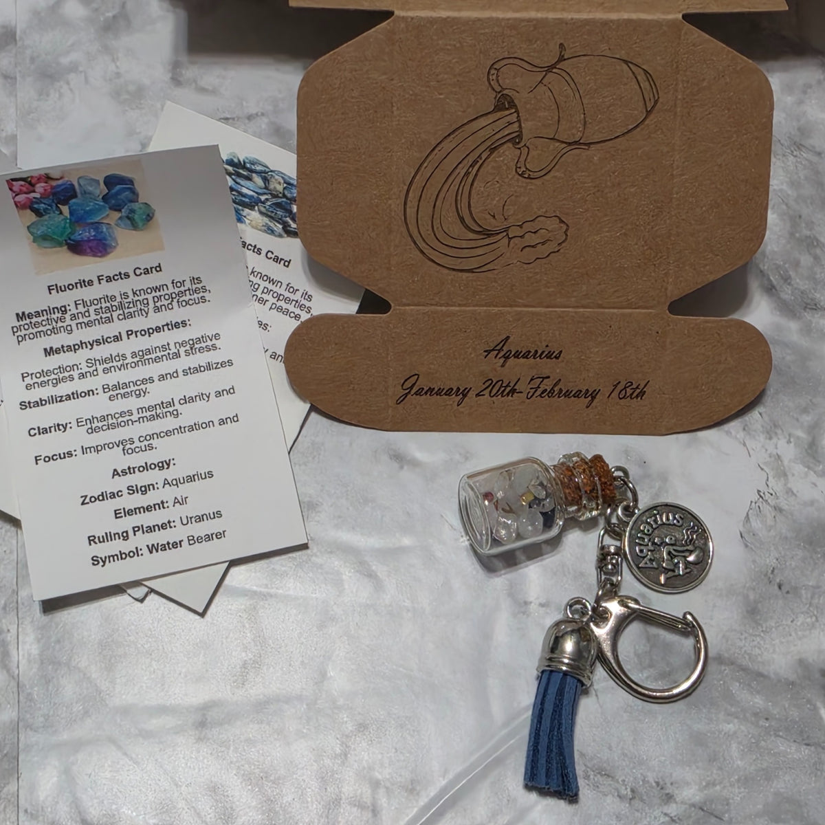 Aquarius handmade crystal bottle keychain with matching engraved zodiac gift box