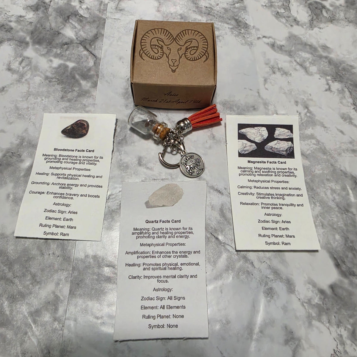 Aries handmade crystal bottle keychain with orange-red tassel, engraved ram gift box and three printed crystal cards