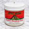Aztec Secret Indian Healing Clay one-pound factory-sealed jar on white marble