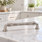 AI lifestyle illustration: One Baldwin Couture4377.150 Satin Nickel cabinet pull on a kitchen island