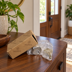 AI lifestyle illustration: Bagged Baldwin8321.150 cylinder and keys with worn carton on an entry console