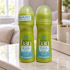 AI-generated lifestyle scene of two capped Ban Purely Gentle roll-on bottles on a bedroom dresser; props not included