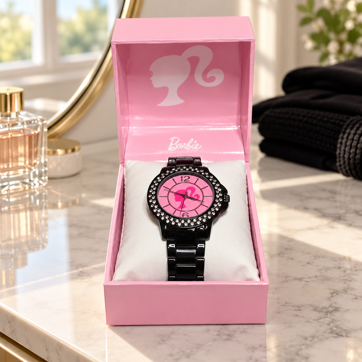 AI illustration of one pink-dial black-link Barbie watch in its presentation box on a home dresser; props not included