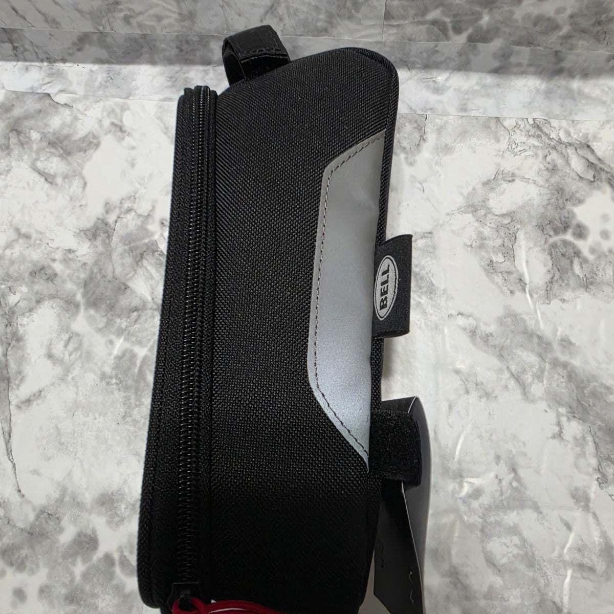Actual black Bell bicycle phone bag showing reflective silver side panel