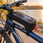 Bell Top Tube Phone Bag mounted on a bicycle at a lakeside stop; lifestyle illustration, phone and bicycle not included