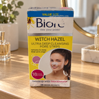 AI-generated dressing-table scene of one Bioré Witch Hazel 18-strip box preserving scuffed packaging; props not included.
