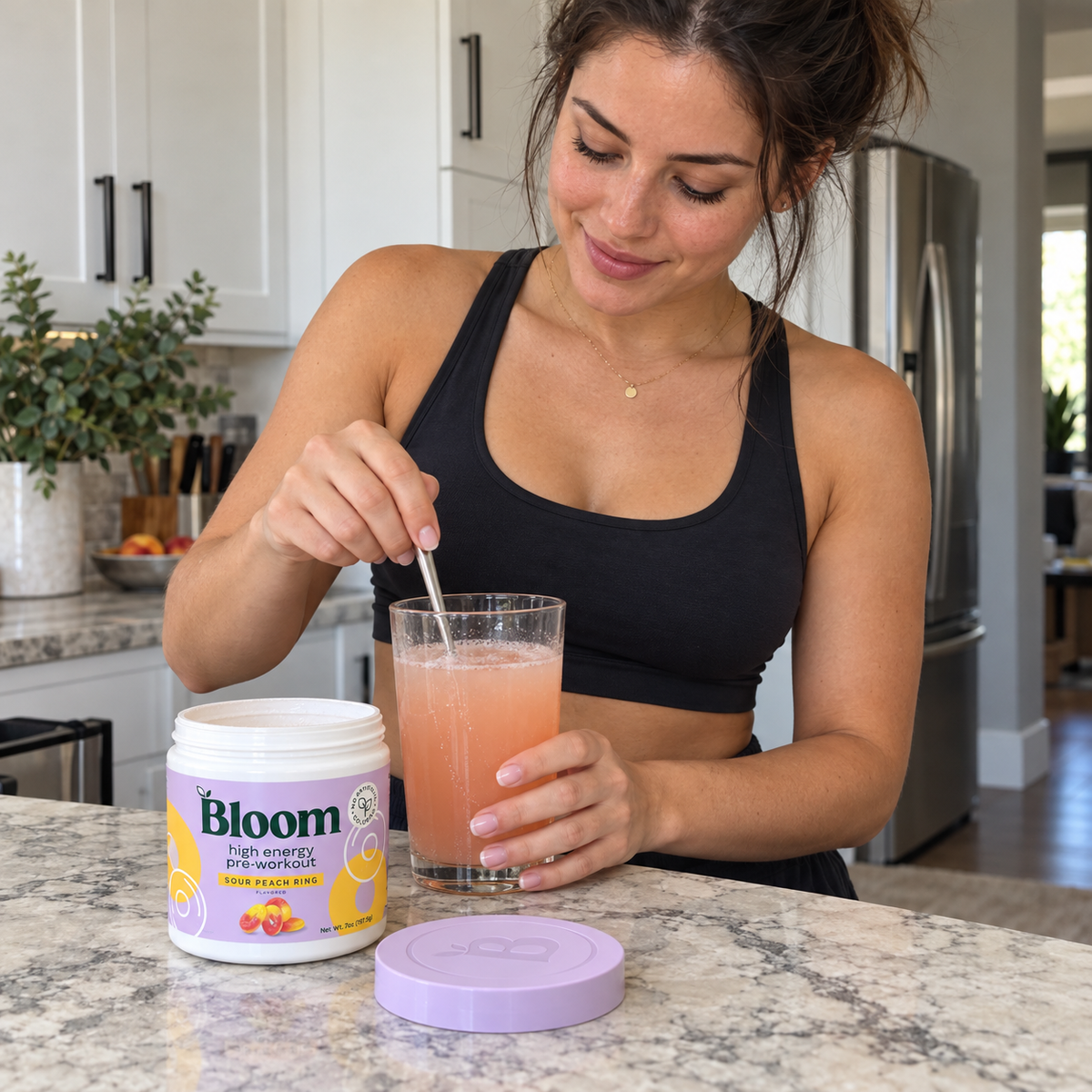 AI-generated illustration: stirring a drink beside one Bloom Sour Peach Ring pre-workout tub; glass and spoon not included.