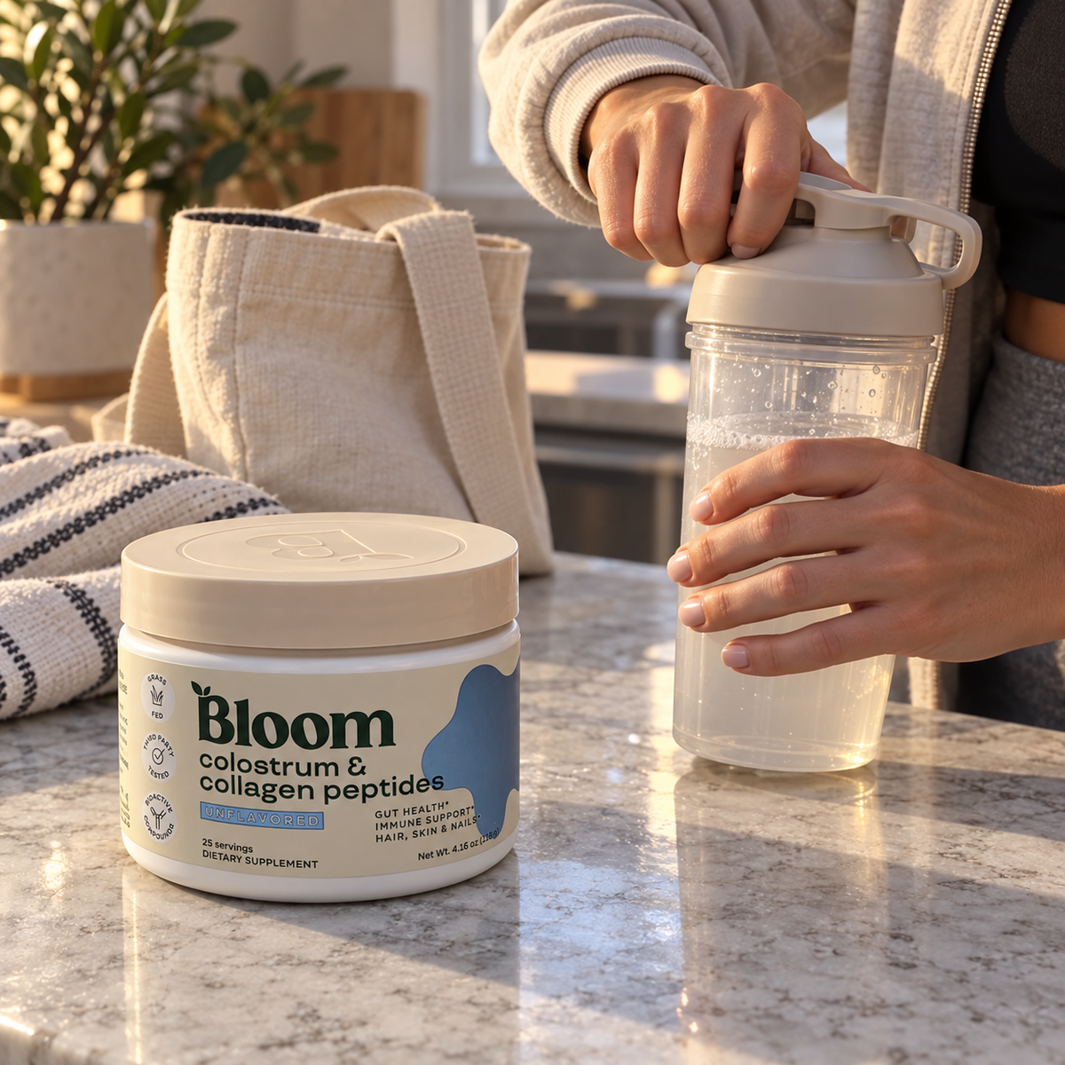 Hands closing a shaker bottle beside Bloom unflavored colostrum and collagen powder