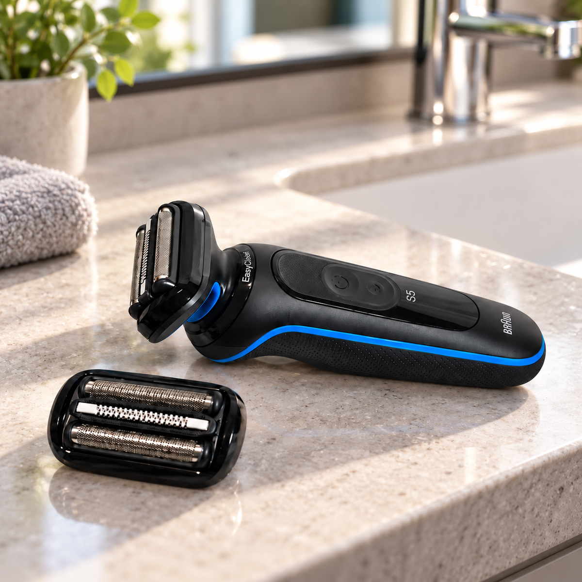 Braun Series 5 5118s no-box option with spare foil head beside a bathroom sink