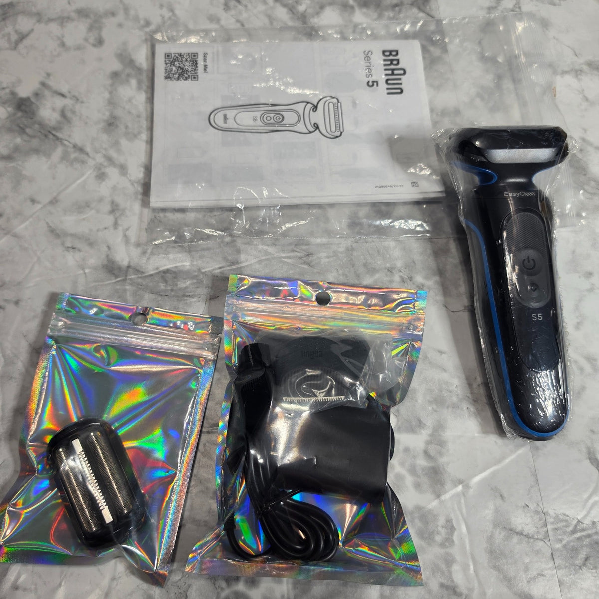 No-box Braun 5118s option individually packed with instructions and extra foil head