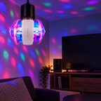 AI-generated lifestyle illustration of a Bytech double-sided disco bulb in a media room; light pattern illustrative, fixture and room props not included.