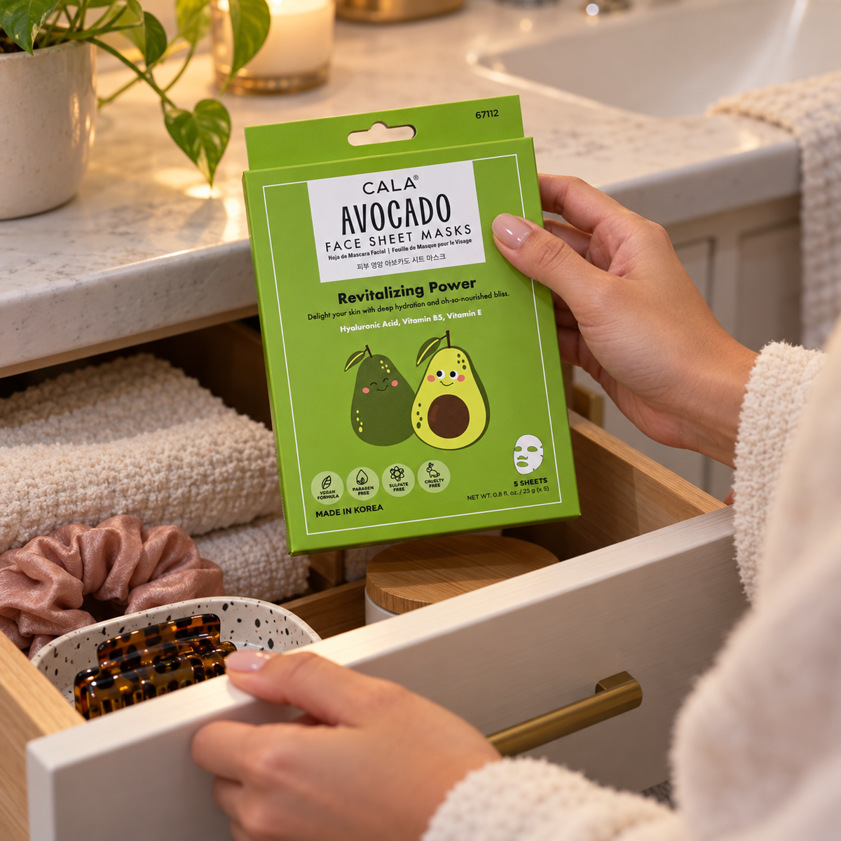 Hand taking a box of CALA Avocado Face Sheet Masks from a bathroom drawer; AI-assisted lifestyle illustration.