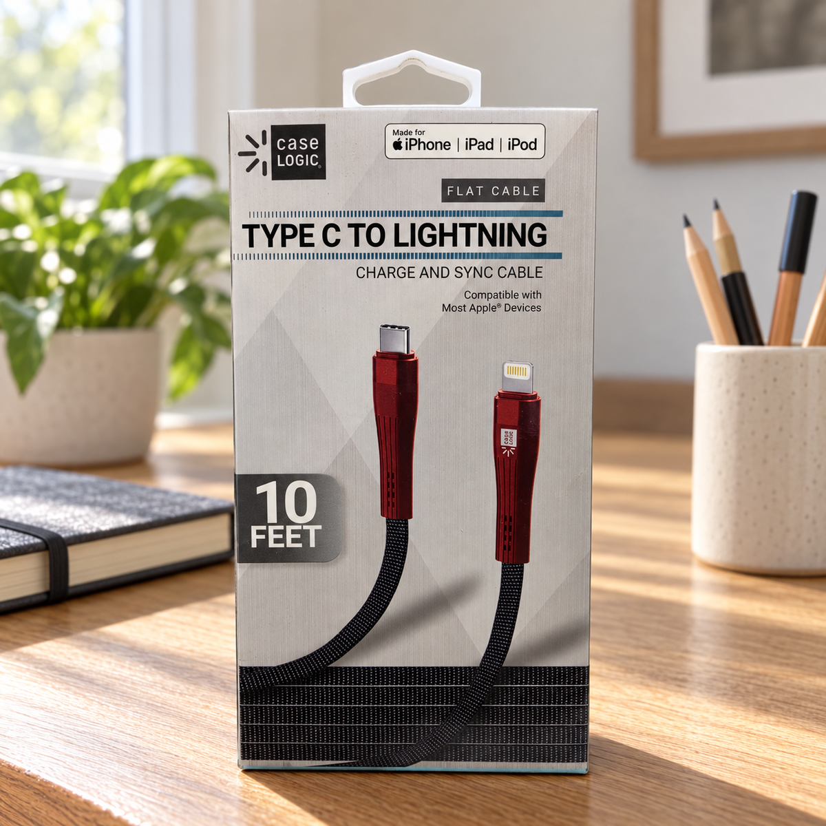 AI-generated scene: actual-design Case Logic 10ft Type C to Lightning cable carton on oak desk beside closed notebook; props excluded
