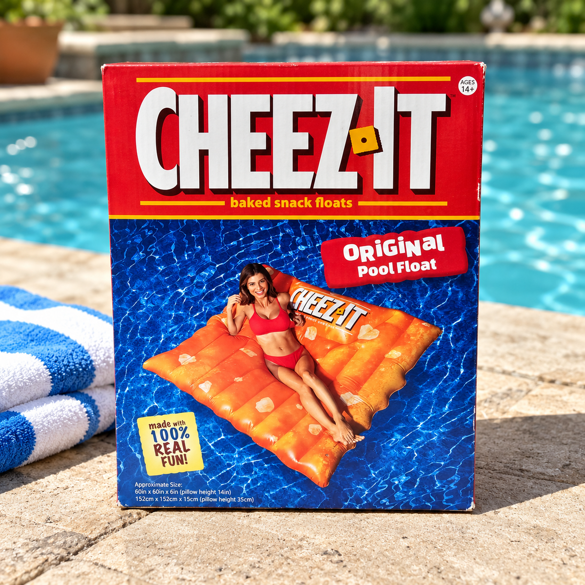 Cheez-It Original pool float retail box on a poolside deck, AI-assisted illustration