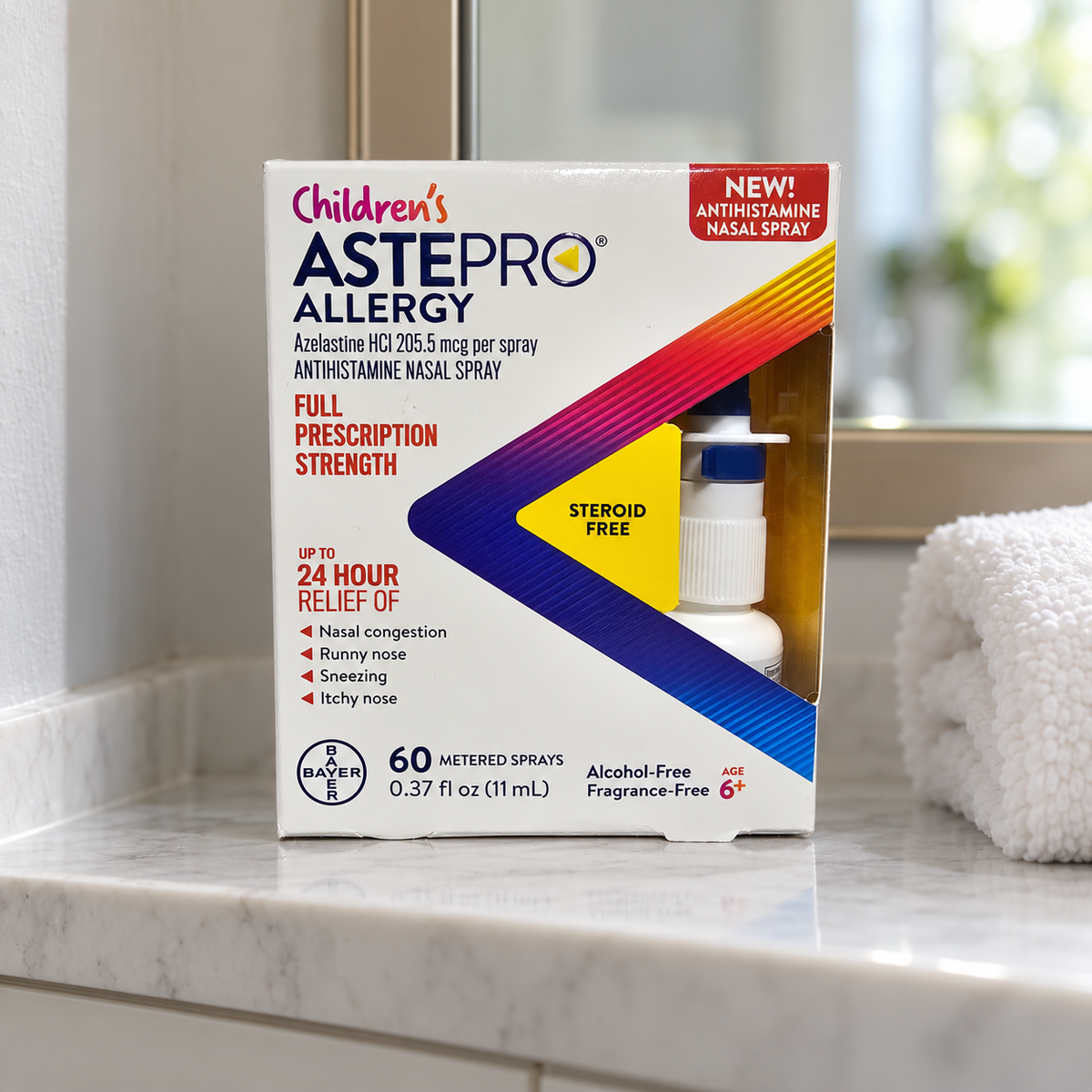 AI-generated context: exact Children's Astepro60-spray11mL retail carton on a bathroom cabinet shelf; towel is a prop, not included.