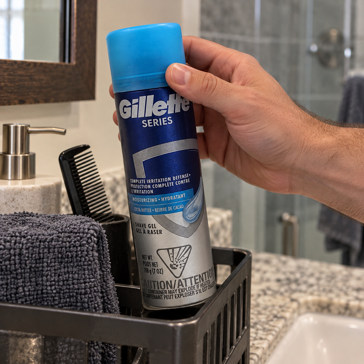 Taking Gillette Series Cocoa Butter shave gel from a bathroom caddy