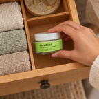 Cocokind Texture Smoothing Cream jar being placed in a wooden dressing-table drawer