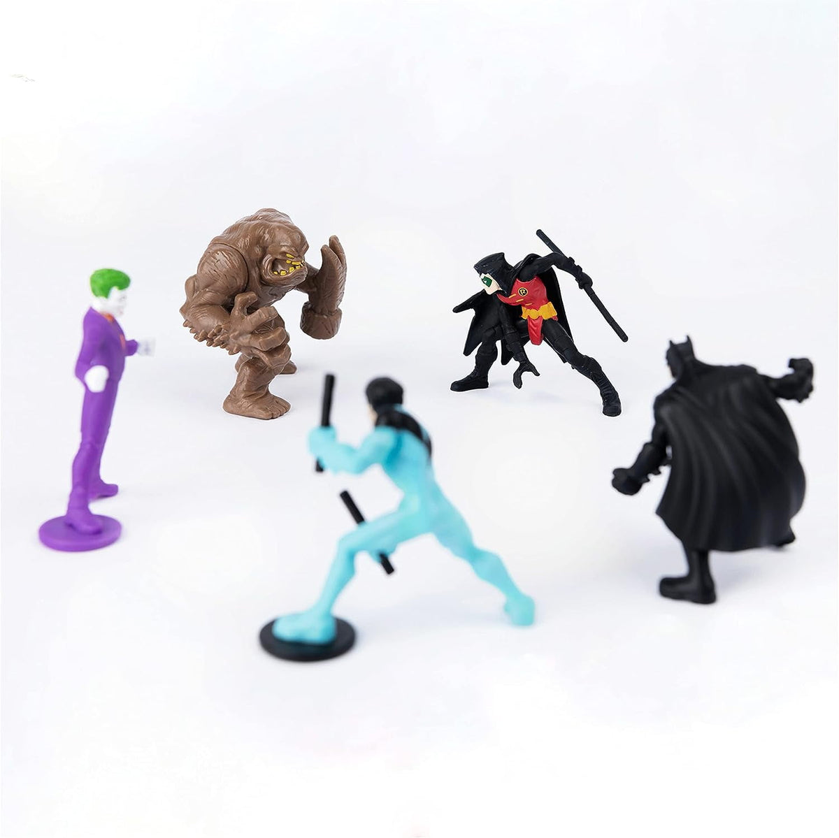 Robin faces Clayface, with Batman, Nightwing and The Joker around them, from the five-figure mini pack.