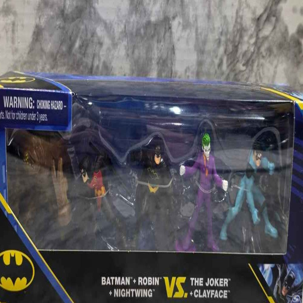 Actual stocked product photo detail of DC Batman Robin Nightwing Joker Clayface 5-figure pack front window.