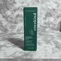 Deep green serum box on marble