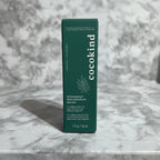Deep green serum box on marble