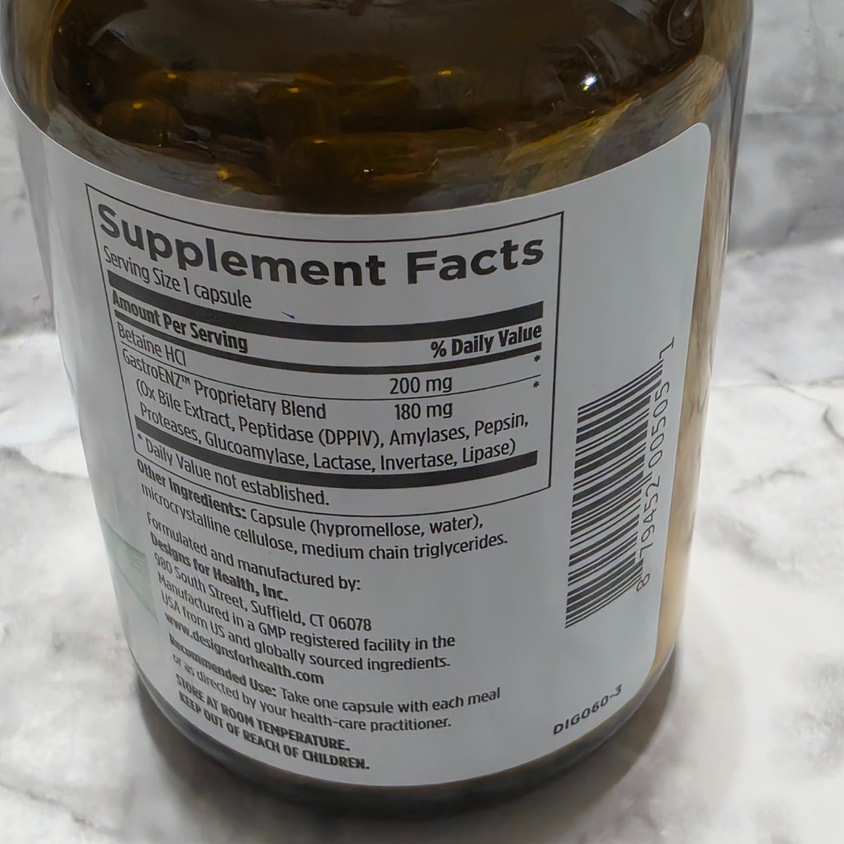 Original photograph of actual Digestzymes bottle Supplement Facts, ingredients including ox bile, directions and UPC