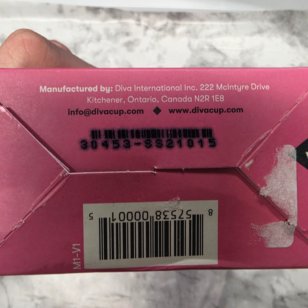 Actual DivaCup Model 1 box manufacturer label, barcode and packaging wear