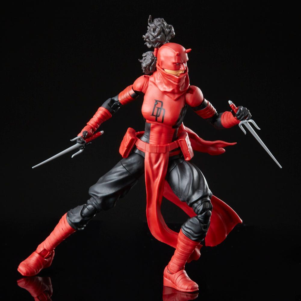 Marvel Legends Elektra Natchios as Daredevil in a crouched action pose holding two sai.
