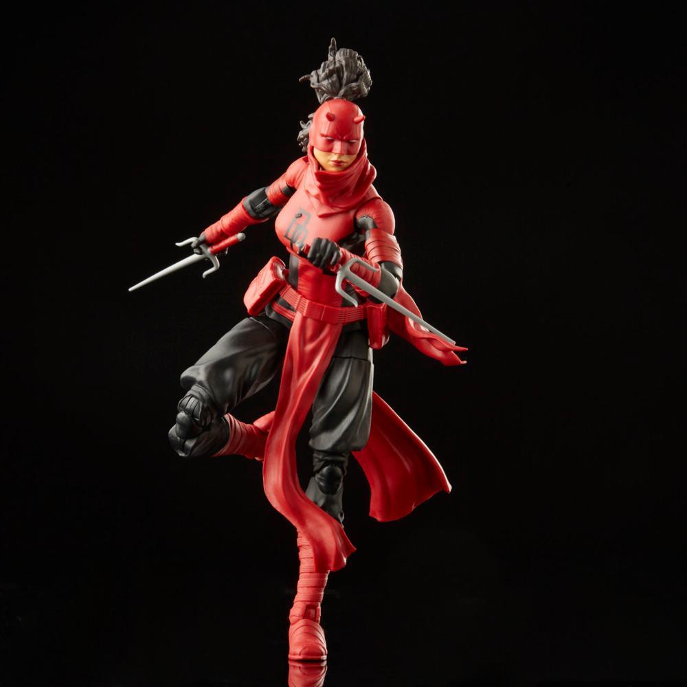Elektra Natchios Daredevil figure with one leg raised, holding two sai.