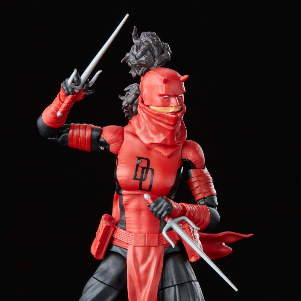Close-up of the Elektra Natchios Daredevil figure showing the red mask, chest emblem and two sai.