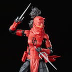 Close-up of the Elektra Natchios Daredevil figure showing the red mask, chest emblem and two sai.
