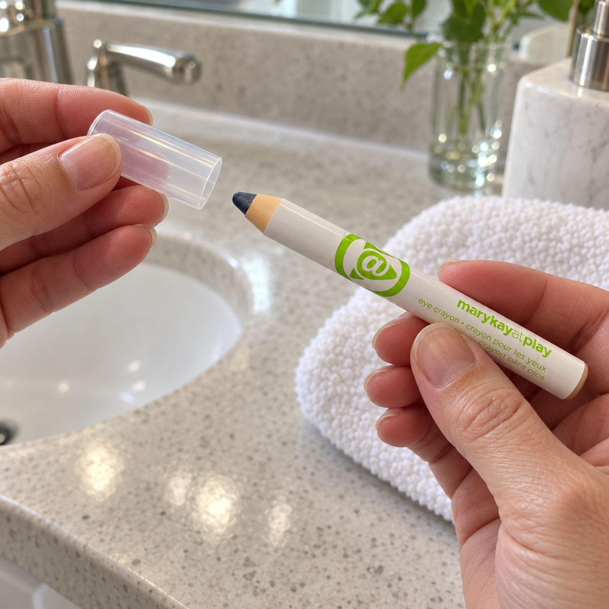 Removing the clear cap from a Mary Kay At Play In the Navy eye crayon.