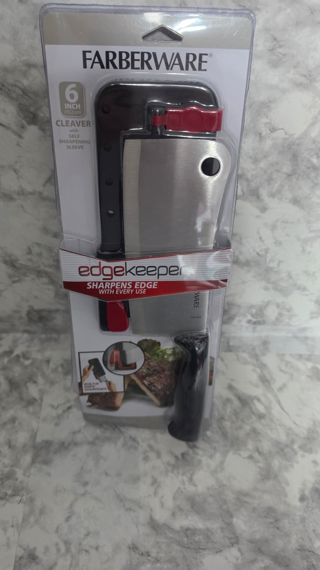 Farberware EdgeKeeper 6-inch cleaver with black handle and self-sharpening sleeve in original retail packaging