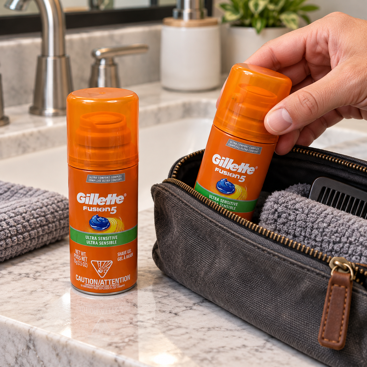 Packing one small Fusion5 shave gel can with a spare beside the toiletry bag