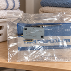 GE WD21X479 float switch in original package, utility shelf lifestyle illustration
