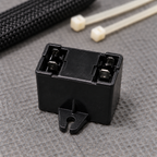 Close view of the capacitor terminal groups and open mounting slot